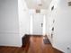 Bright entryway with hardwood floors and a classic white front door at 2840 General Lee Way, Buford, GA 30519