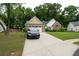 Charming single-story home with a well-manicured lawn and a paved driveway at 2840 General Lee Way, Buford, GA 30519