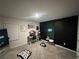 Nicely decorated bedroom with great workspace, accent wall, and carpeted floors at 7621 Gray Pointe Dr, Lithonia, GA 30058