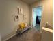 Hallway featuring a bench and doorway to the main bedroom at 7621 Gray Pointe Dr, Lithonia, GA 30058