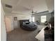 Bright main bedroom featuring a round bed, neutral walls, and ample natural light at 7621 Gray Pointe Dr, Lithonia, GA 30058