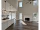 Bright, open concept with views of the kitchen, which features a modern island and stylish cabinets at 479 Rising Sun Path, Lawrenceville, GA 30043