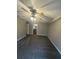 Bedroom with ceiling fan and gray carpeting throughout the space at 123 Rue Fontaine, Lithonia, GA 30038