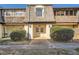 Charming townhome with a welcoming front entrance and well-maintained landscaping at 123 Rue Fontaine, Lithonia, GA 30038