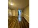 Spacious living area with ample natural light and modern flooring at 123 Rue Fontaine, Lithonia, GA 30038