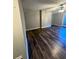Bright living room with new flooring and a ceiling fan at 123 Rue Fontaine, Lithonia, GA 30038
