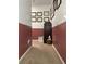 Hallway with two-tone walls and carpeted floor at 2366 Bigwood Trl, Atlanta, GA 30349
