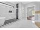 A luxurious bathroom featuring a soaking tub, a glass shower and a bright vanity at 3312 Mill Forest Dr, Conyers, GA 30094