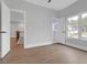 Bright bedroom with a view, wood-look floors and lots of light at 3312 Mill Forest Dr, Conyers, GA 30094