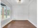 Clean dining area with a geometric wall design and neutral decor, with large windows for natural light at 3312 Mill Forest Dr, Conyers, GA 30094