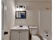Neutral bathroom featuring a vanity, mirror, light fixture, toilet, and bathtub with shower at 4384 Raven Valley Ct, Decatur, GA 30035