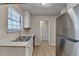 Kitchen featuring stainless steel appliances, marble countertops, and modern cabinets at 4384 Raven Valley Ct, Decatur, GA 30035