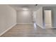 Neutral living room with sleek modern flooring and easy access to other rooms at 4384 Raven Valley Ct, Decatur, GA 30035