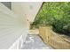 A wooden deck with railings is attached to the side of the house at 5729 Jefferson Ave, Forest Park, GA 30297