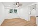 Bedroom features neutral walls, light wood floors, recessed lights, and a ceiling fan at 5729 Jefferson Ave, Forest Park, GA 30297