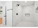 Modern shower features marble-style tile, rainfall showerhead, and a built-in niche for bath products at 5729 Jefferson Ave, Forest Park, GA 30297