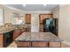 Well-equipped kitchen featuring granite countertops and stainless steel refrigerator at 971 Reap Lane, Lawrenceville, GA 30043