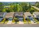 An aerial view of the neighborhood's well-maintained lawns and neighborhood street at 704 Chipping Sparrow St, Canton, GA 30115