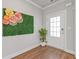 Bright foyer with modern decor, hardwood floors, and a stylish entrance at 704 Chipping Sparrow St, Canton, GA 30115