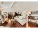 Spacious living room with hardwood floors, high vaulted ceiling, and elegant furnishings at 125 Fortuna Ct, Roswell, GA 30075