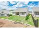 A home's backyard features green grass and a covered patio, perfect for outdoor relaxation at 213 Hickory Bluffs Pkwy, Canton, GA 30114