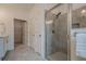 Modern bathroom with a glass-enclosed tiled shower, vanity with storage and lots of light at 213 Hickory Bluffs Pkwy, Canton, GA 30114