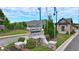 Welcome to Hickory Bluffs, an inviting community with attractive landscaping and signage at 213 Hickory Bluffs Pkwy, Canton, GA 30114