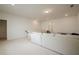 Spacious living room with neutral carpet, light paint, and large sectional sofa at 213 Hickory Bluffs Pkwy, Canton, GA 30114