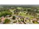 An elevated neighborhood featuring beautiful homes surrounding a golf course with mature trees and tranquil water features at 2211 Lattimore Farm Nw Dr, Kennesaw, GA 30152