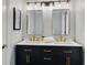 Modern bathroom featuring double sinks, gold hardware, and updated fixtures at 2211 Lattimore Farm Nw Dr, Kennesaw, GA 30152