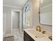Bathroom vanity with white marble floors and countertop at 2211 Lattimore Farm Nw Dr, Kennesaw, GA 30152