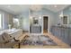 A spacious primary bathroom with a soaking tub, shower, and dual vanities at 2211 Lattimore Farm Nw Dr, Kennesaw, GA 30152