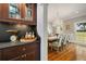 Well-appointed dining room with wood floors and access to the butlers pantry at 2211 Lattimore Farm Nw Dr, Kennesaw, GA 30152