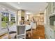Charming kitchen with custom cabinetry, stainless steel appliances, and a breakfast nook with scenic views at 2211 Lattimore Farm Nw Dr, Kennesaw, GA 30152