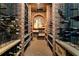 Basement wine cellar with brick flooring and wine storage racks at 2211 Lattimore Farm Nw Dr, Kennesaw, GA 30152
