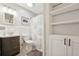 Clean bathroom with updated vanity, neutral decor, and shower-tub combination at 2586 Valley Stream Dr, Atlanta, GA 30360