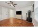 Relaxing bedroom featuring hardwood floors, natural light, and comfortable design at 2586 Valley Stream Dr, Atlanta, GA 30360