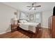 Comfortable bedroom with hardwood floors, natural light, and warm, inviting decor at 2586 Valley Stream Dr, Atlanta, GA 30360