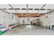 Spacious garage with ample storage space, painted walls, and multiple windows for natural light at 2586 Valley Stream Dr, Atlanta, GA 30360