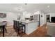 Modern kitchen with an island, stainless steel appliances, and hardwood floors at 2586 Valley Stream Dr, Atlanta, GA 30360