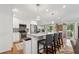 Beautiful kitchen with an island, barstool seating, modern cabinets, and stainless appliances at 2586 Valley Stream Dr, Atlanta, GA 30360