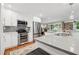 Updated kitchen features modern appliances, a kitchen island, and stylish finishes at 2586 Valley Stream Dr, Atlanta, GA 30360