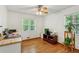 Bright room with hardwood floors, a desk, and ample natural light, ideal for a home office at 261 Demetra Se Dr, Mableton, GA 30126
