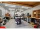 Spacious and well-lit workshop with storage shelving, work benches and a table saw at 261 Demetra Se Dr, Mableton, GA 30126