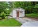 Detached garage with convenient driveway access and ample space for parking and storage at 261 Demetra Se Dr, Mableton, GA 30126