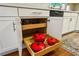 Kitchen drawers storing cookware, complemented by white cabinetry and hardwood floors at 261 Demetra Se Dr, Mableton, GA 30126