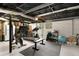 Finished basement with gym, storage, and room for potential customization in an open layout at 283 Norton Se Cir, Smyrna, GA 30082