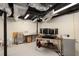 Finished basement featuring an office area with black metal legs and exposed HVAC at 283 Norton Se Cir, Smyrna, GA 30082