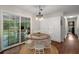 Bright dining area features sliding glass doors and hardwood floors at 283 Norton Se Cir, Smyrna, GA 30082