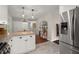 Well-lit kitchen featuring granite countertops, stainless steel appliances, and modern cabinetry at 283 Norton Se Cir, Smyrna, GA 30082